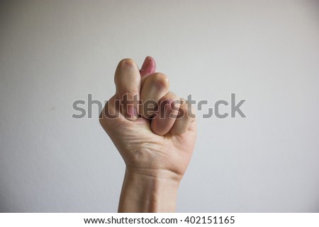The bathroom symbol hand