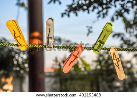 Clothespins and Clothes line on blur background 