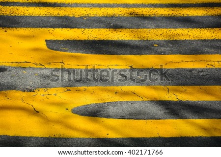 Asphalt road with yellow lines