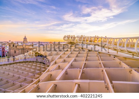 From the top of the Space Metropol Parasol (Setas de Sevilla) one have the best view of the city of Seville, Spain. It provides a unique view of the old city center and its traditional buildings. Royalty-Free Stock Photo #402221245