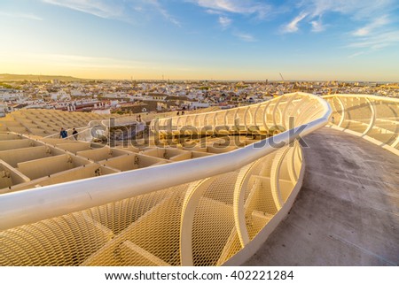 From the top of the Space Metropol Parasol (Setas de Sevilla) one have the best view of the city of Seville, Spain. It provides a unique view of the old city center and its traditional buildings. Royalty-Free Stock Photo #402221284