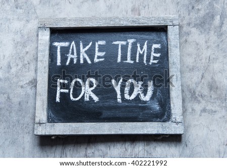 Take time for you - handwritten on a chalkboard