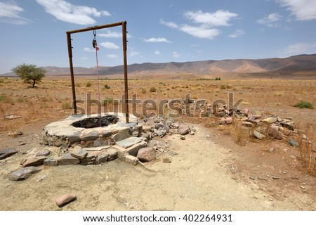 Water well in Sahara Desert, Morocco, North Africa Royalty-Free Stock Photo #402264931