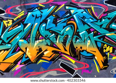 Beautiful street art of graffiti. Abstract color creative drawing fashion on walls of  city. Urban contemporary culture. Title paint on walls. Culture youth protest. ABSTRACT PICTURE Royalty-Free Stock Photo #402303346