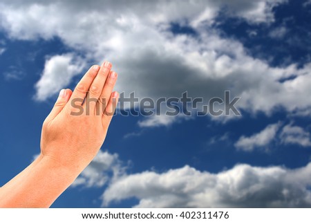 sign hand welcome expression sawasdee thailand culture  on sky-clouds background.