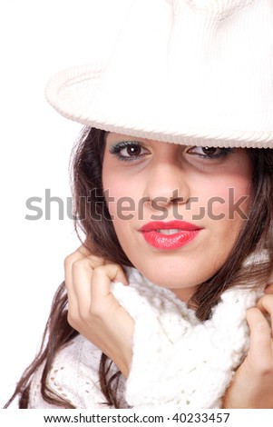  Closeup of young beautiful girl, wearing winter hat and scarf