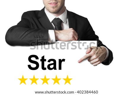 businessman in black suit pointing on white sign star golden rating vip