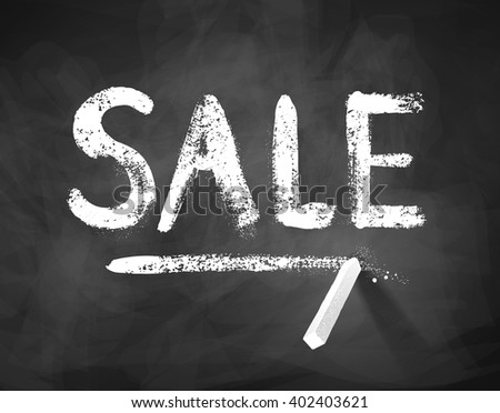 Sale word lettering on blackboard background with peace of chalk.