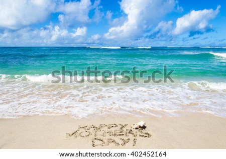 Mother's day background on the sandy beach near ocean