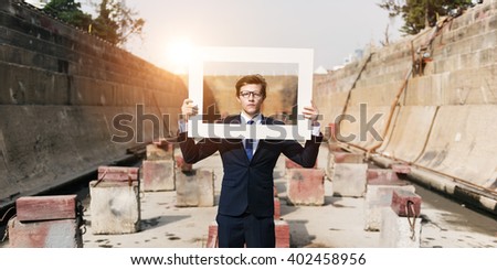 Businessman Picture Frame Holding Concept