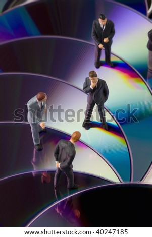 Several men are holding a meeting on the disk.