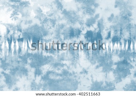 tie dye pattern on cotton fabric abstract background.

