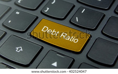 Business Concept: Close-up the Debt Ratio button on the keyboard and have Gold, Yellow color button isolate black keyboard