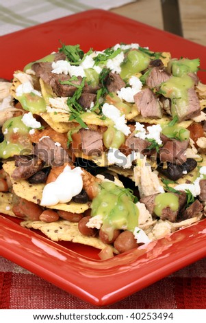 An exquisite organic mexican nachos with wheat corn tortilla and hormone free beef