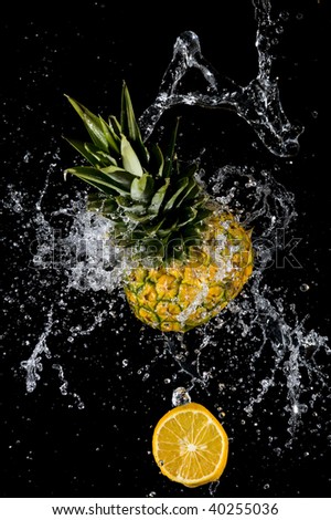Pineapple with splashing water