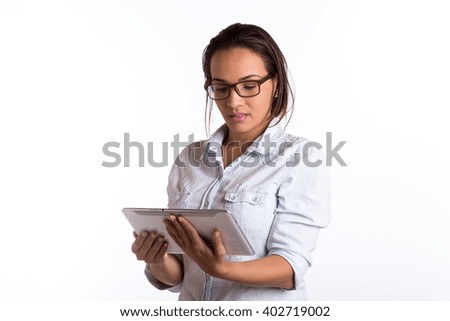 beautiful woman with glasses holding a tablet with white background
