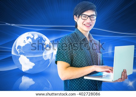Smiling hipster businessman using tablet against global technology background