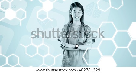 Asian nurse with arms crossed against medical icons