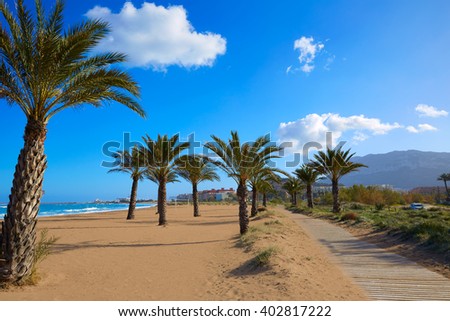 Denia beach Las Marinas with palm trees in Mediterranean Alicante of Spain Royalty-Free Stock Photo #402817222
