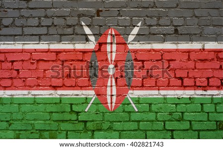 Flag of Kenya painted on brick wall, background texture