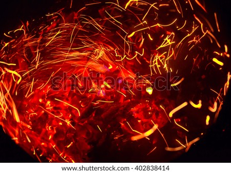 flames and sparks in motion. Blurred
