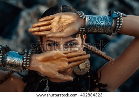 tribal woman portrait outdoors Royalty-Free Stock Photo #402884323