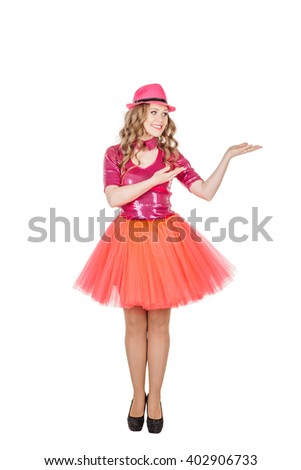 Dancing Blonde show girl showing copy space for product or advertising text . Isolated over white background
