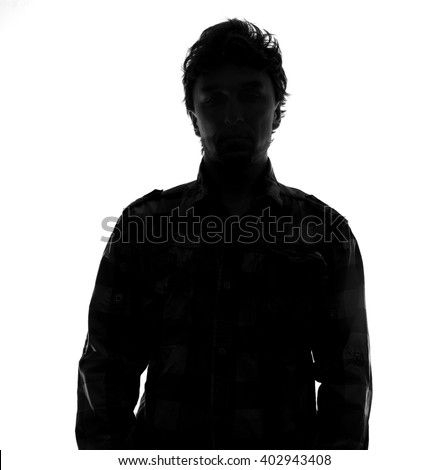 Hidden face in the shadow.male person silhouette Royalty-Free Stock Photo #402943408