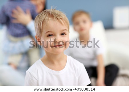 Portrait of cute boy in the room, close up