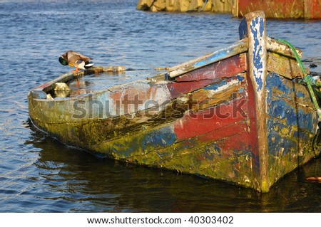 old boat with duck