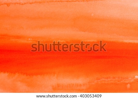 orange warm watercolors on textured paper surface - design element - abstract background
trend color orange tangerine