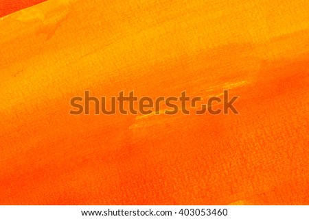orange warm watercolors on textured paper surface - design element - abstract background
trend color orange tangerine