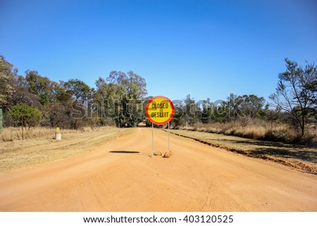A road closure sign in the South African bushveld.