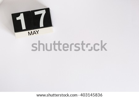 May 17th. Image of may 17 wooden color calendar on white background.  Spring day, empty space for text.  International Day Against Homophobia, IDAHOBIT