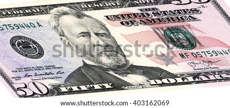 closeup of the obverse sides of the banknote in a fifty dollars isolated on white with Clipping Path.