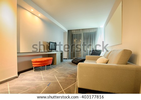 Interior of a luxury hotel room in the evening