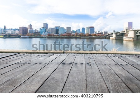 empty wood floor with cityscape and skyline in portland