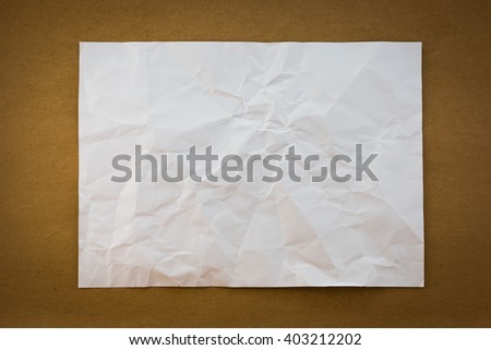 White crumpled paper on wood paper background texture vintage style with vignette