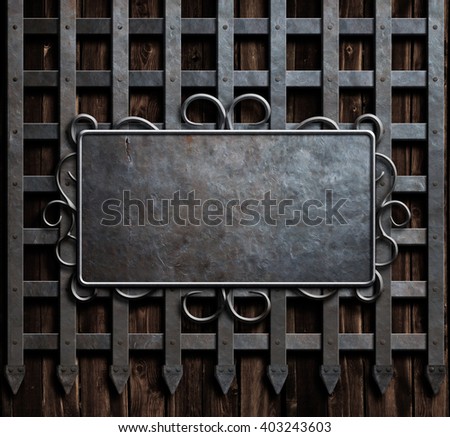 mteal plate on medieval castle gate or wall background