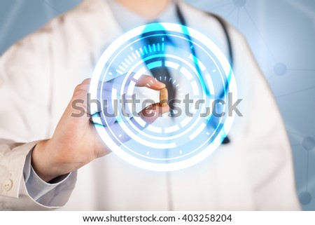 A male  doctor in white coat showing a glowing pill in blue, white circles