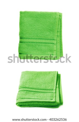 Single green terry cloth towel isolated over the white background, set collection of two different foreshortenings