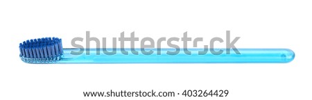 Plastic blue toothbrush isolated over the white background