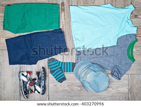 Flat lay photography of kid's casual outfits. 