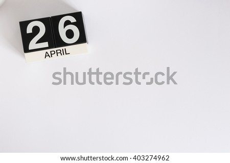 April 26th. Image of april 26 wooden color calendar on white background.  Spring day, empty space for text