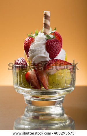 strawberry cup with whipped cream decorated