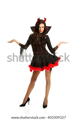 Woman in devil clothes with open hands gesture 