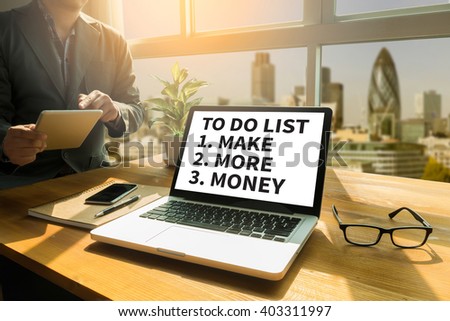 TO DO LIST  - Make More Money Thoughtful male person looking to the digital tablet screen, laptop screen,Silhouette and filter sun