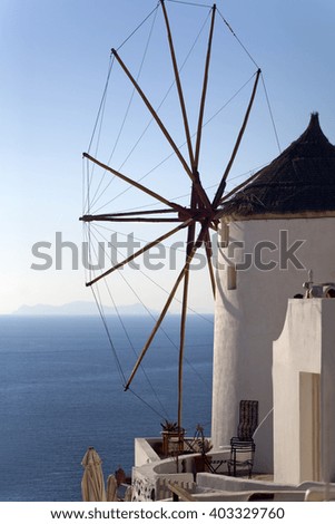 Traditional Greek windmill in Oia on Santorini island in the Greek Aegean sea