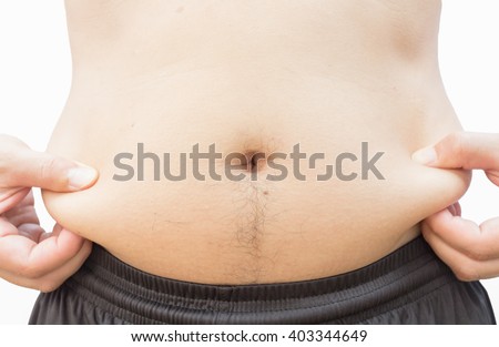 Overweight man. hand pinching fat body paunch Royalty-Free Stock Photo #403344649