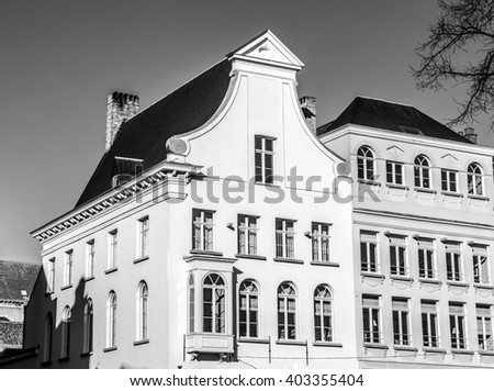 Ancient building of medieval Brugge, Belgium. Black-white photo.